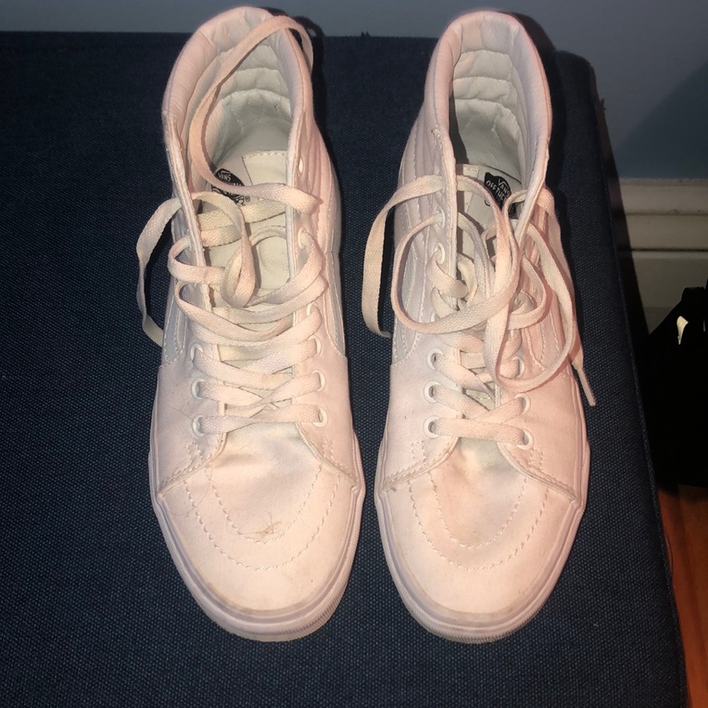 White high top vans.